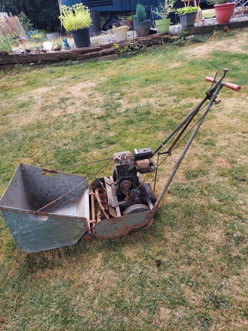 50 60's real lawn mower.