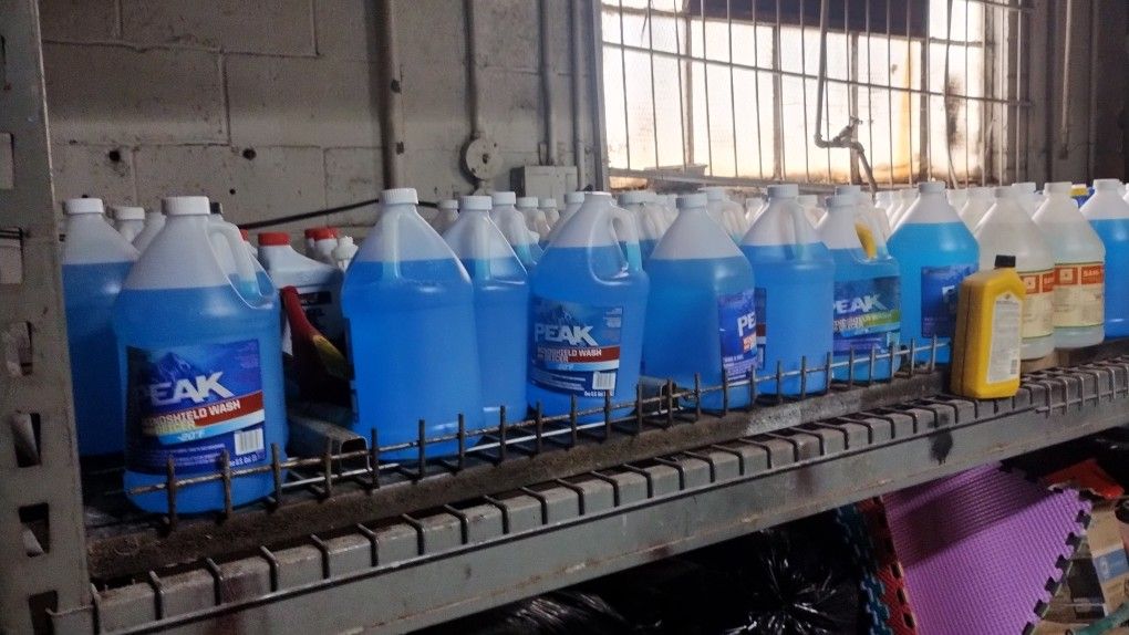 A Lot Of Windshield Cleaner And Some A Different Oils Jeep Radio And In Dash Radio And Back Camera