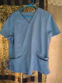 A Nice Women's Light Blue Scrub Top