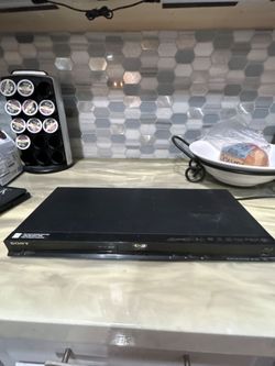 DVD player, VHS player, various DVDs and VHS tapes