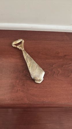 Silver plated neck tie bottle opener