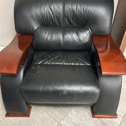 Leather and wood armchair 