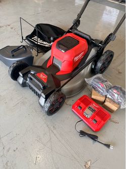 New, open box, Milwaukee M18 FUEL Brushless Cordless 21 in. Walk Behind Dual Battery Self-Propelled Mower w/(2) 12.0Ah FORGE Battery and Charger