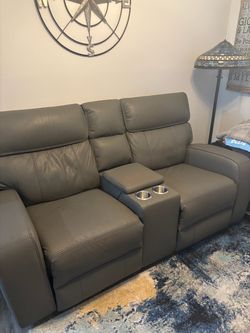 City Furniture gray leather reclining loveseat