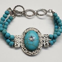 Dyed BLUE HOWLITE Bead Bracelet. 75 ctw in Silvertone Link Alloy. 7"-9"