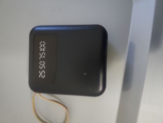 A portable charger with a flashlight.