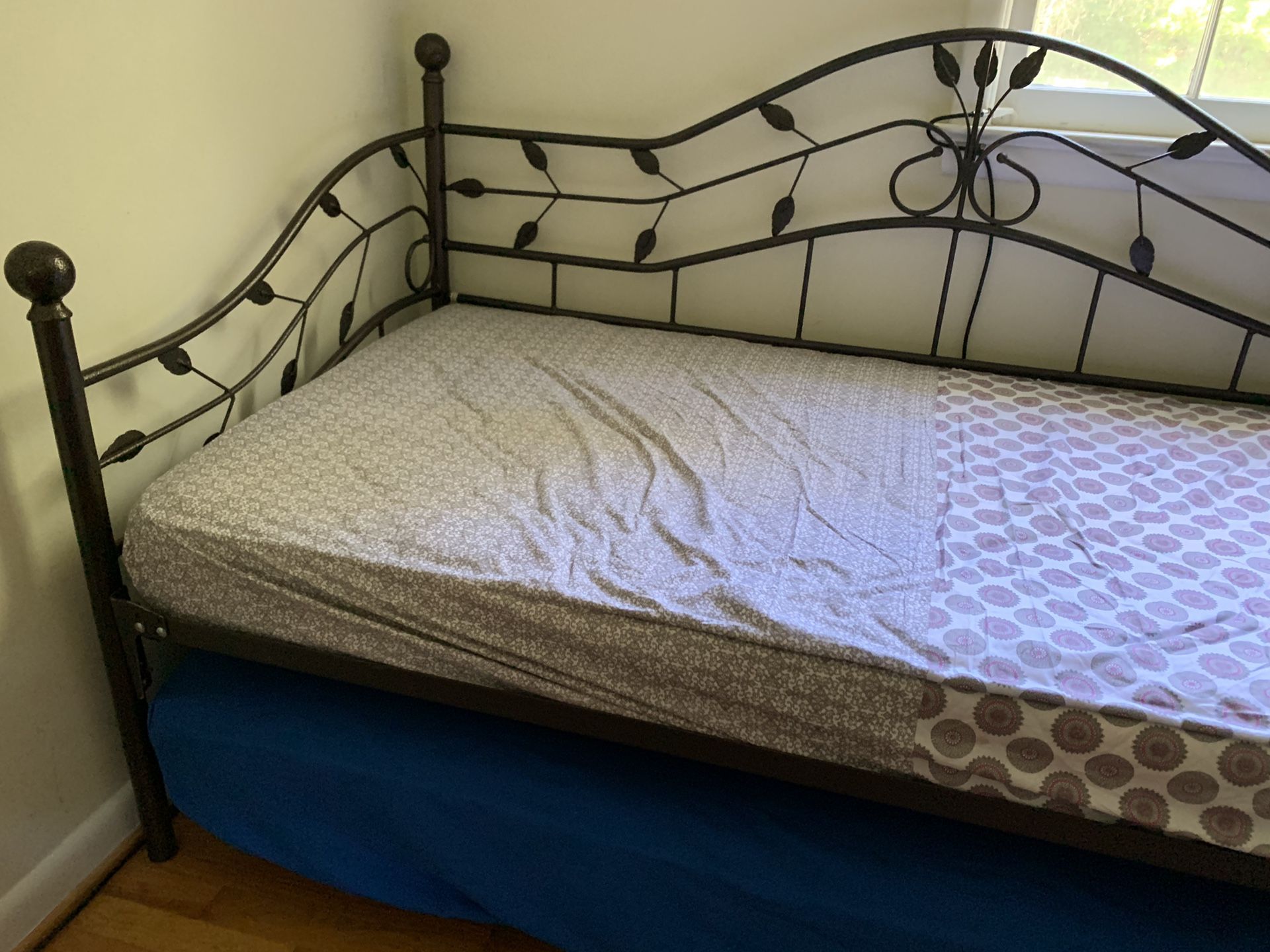 Daybed with trundle and 2 mattresses.