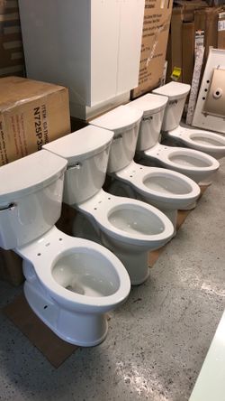 American Standard Champion Elongated Toilet in White bath bathroom