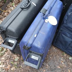 TWO PULL ALONG SUITCASES 