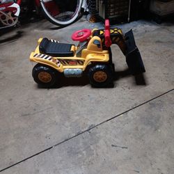 Fisher Price Ride On Excavator With Sounds  Great Condition.has Hornkey Startand A Couple More Sounds SEAT Lifts Up For Storage.