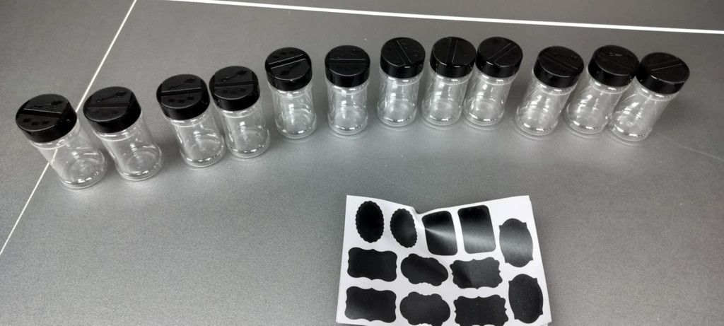 12 clear salt pepper spice dispensary containers with labels and pens
