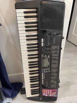 Vintage Casio keyboard with stand piano teclado