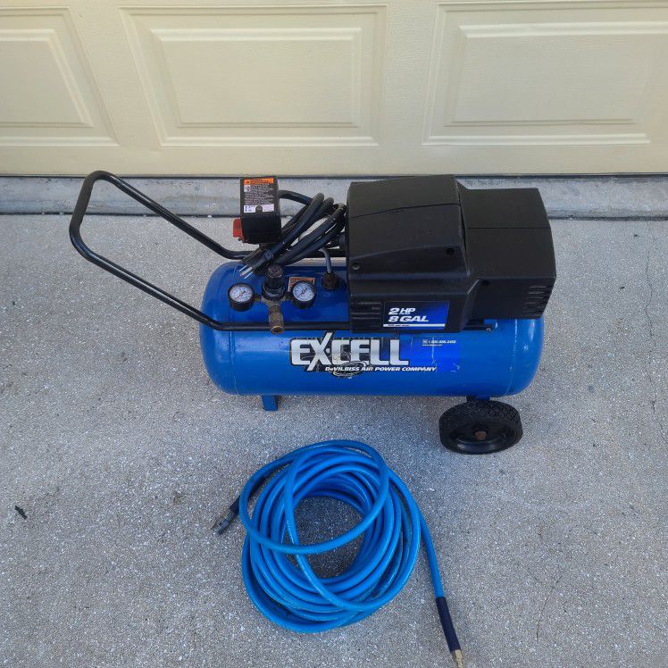 Air Compressor Excell Develbiss  2HP, 8 Gallon, Good Condition, 50' Air Hose, First Come First Served.