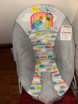 Baby bouncer with attached toy
