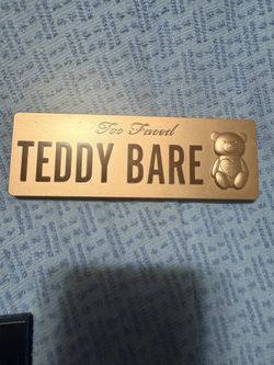 Two-faced teddy bear