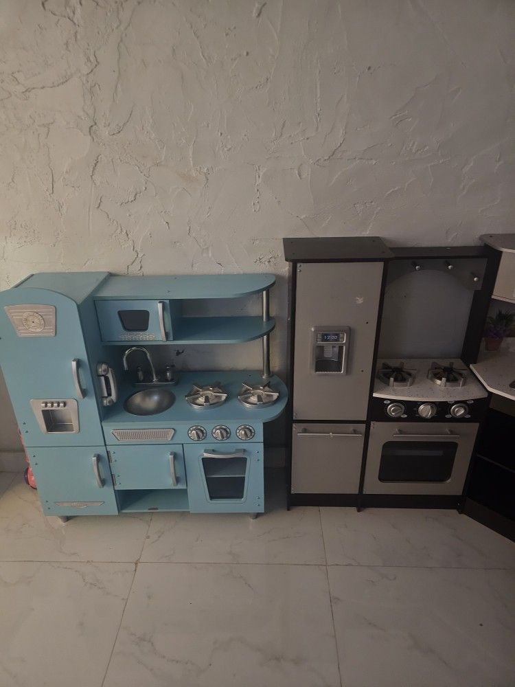Two Toy Kitchens With Shopping Cart And Food