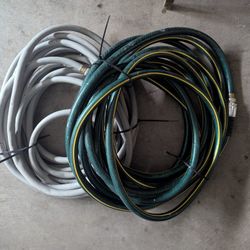 Two Perfect Condition 50 -each- Garden Hoses. 