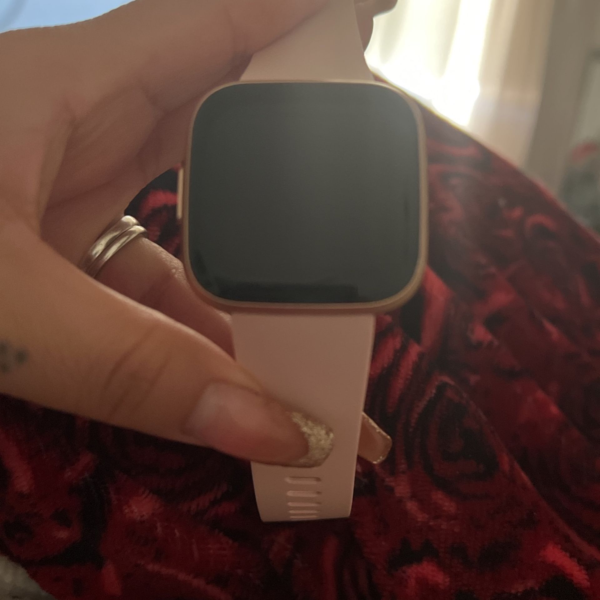 2 Months Old. Fitbit Versa 2 