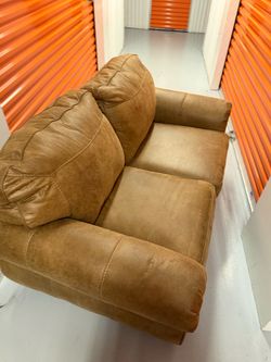 Brown Leather Loveseat