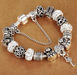 Silver and rhinestone pandora like bracelet