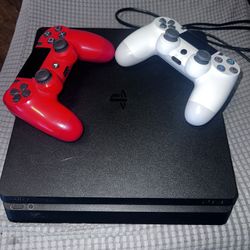 Sony Play Station 4 with 2 remotes  And 4 Games 