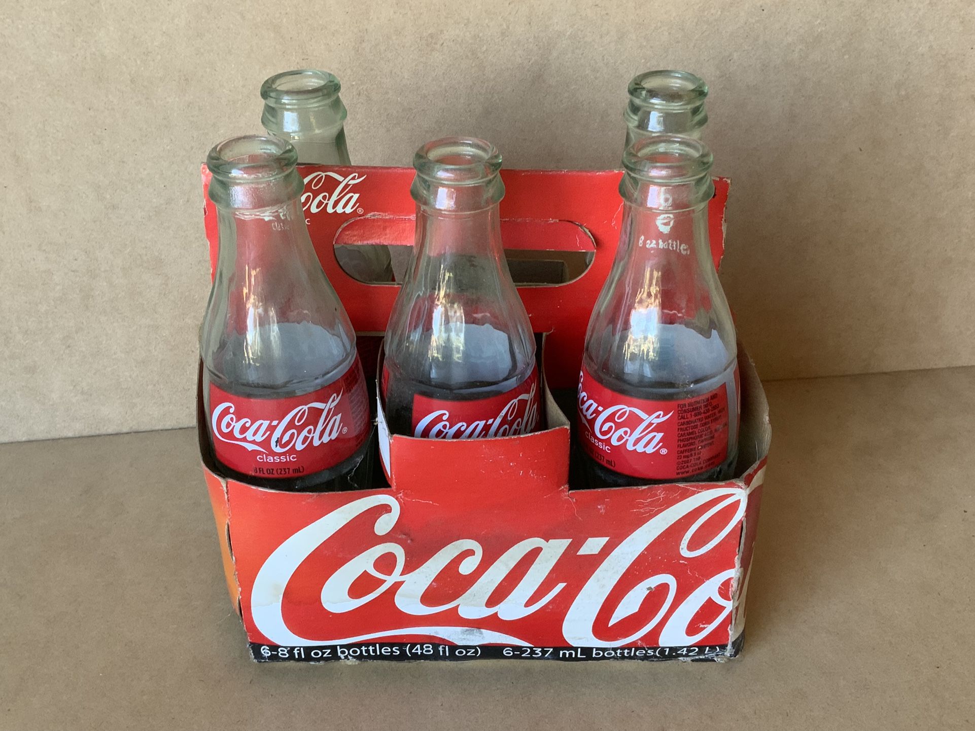 (5) Coca Cola Antique Bottles