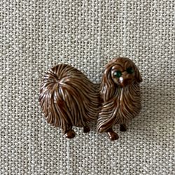Gerry’s Pin (dog with green eyes)