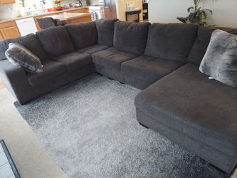 Practically new high end Gray sectional from Broadway furniturePractically new high end Gray sectional from Broadway furniture