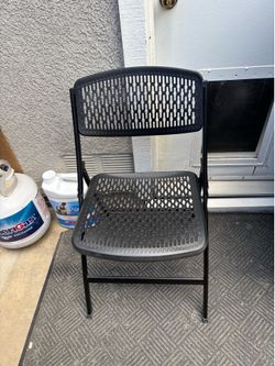 Black Folding Chairs •