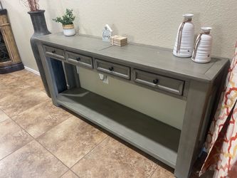 Sofa Entry Table. 4 Drawers couple light scratches on top. Great Condition Located in East Mesa Near Signalbutte And Elliot. Non smoking home.  63 Lon