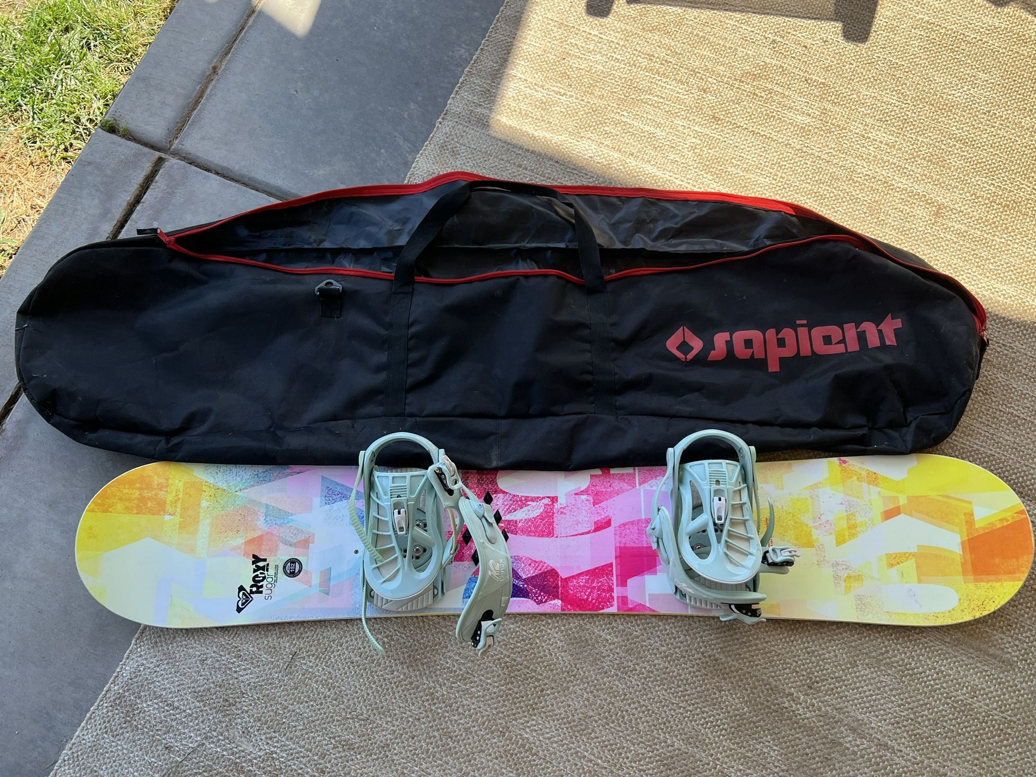 Roxy Snowboard with bindings and carrying bag