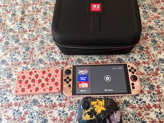 Nintendo Switch with Pink Shell and Accessories