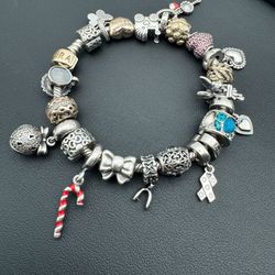 Pandora 925 sterling silver gold  7.5” charm bracelet with 22 charms