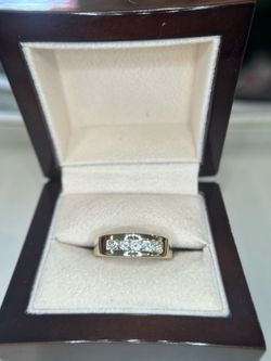 Gold 5 diamond channel set ring