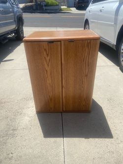 Video Cabinet for DVDs and VHS tapes.