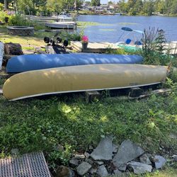 16 Ft. Old town Yellow Canoe With Paddles