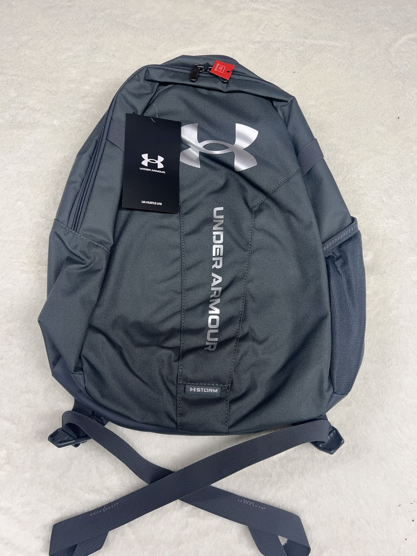 NEW Under Armour Storm Backpack! Color Is Gray And Silver And Is Brand New With Tags!