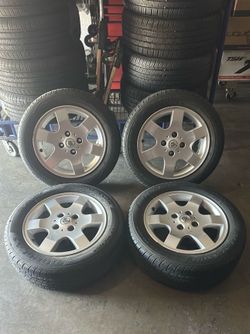 16” rims with tires  4x114.3 nissan  firm price,,,,