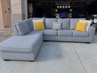 Absolutely gorgeous Ashley’s gray sectional couch !!
