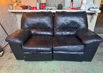 Beautiful dark brown leather loveseat