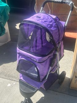 Brand new purple dog stroller for $60
