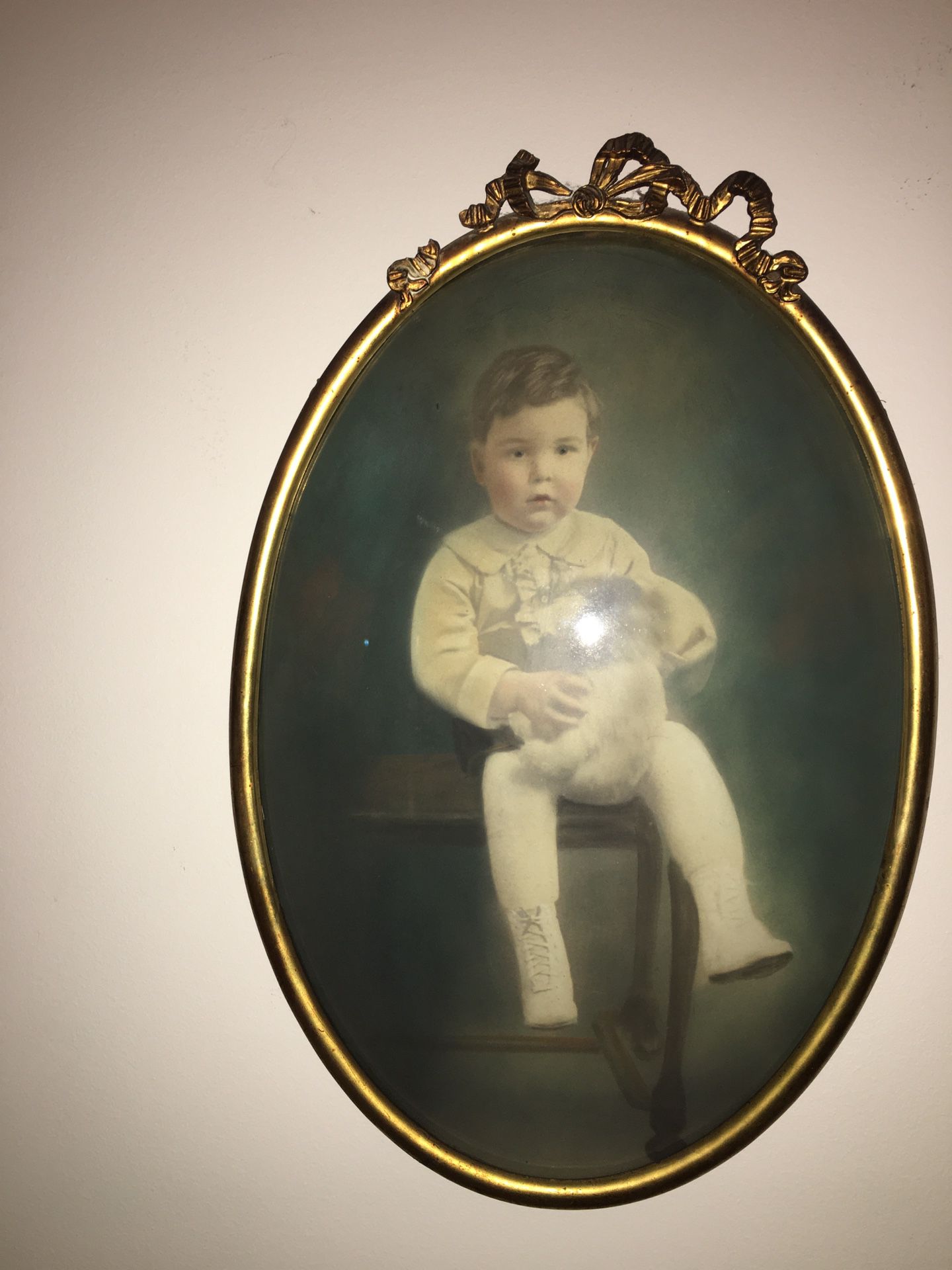 Old hand colored photo of child