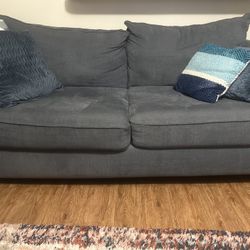 Blue Sofa With Pillows 