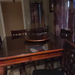 A Table And  4 Chairs 