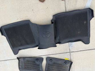 Toyota tundra all weather OEM mats and a rough country rubber bed Mat