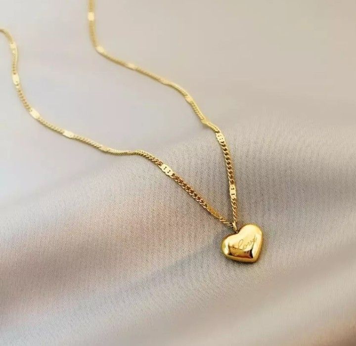 Love Flouting Heart Pendant