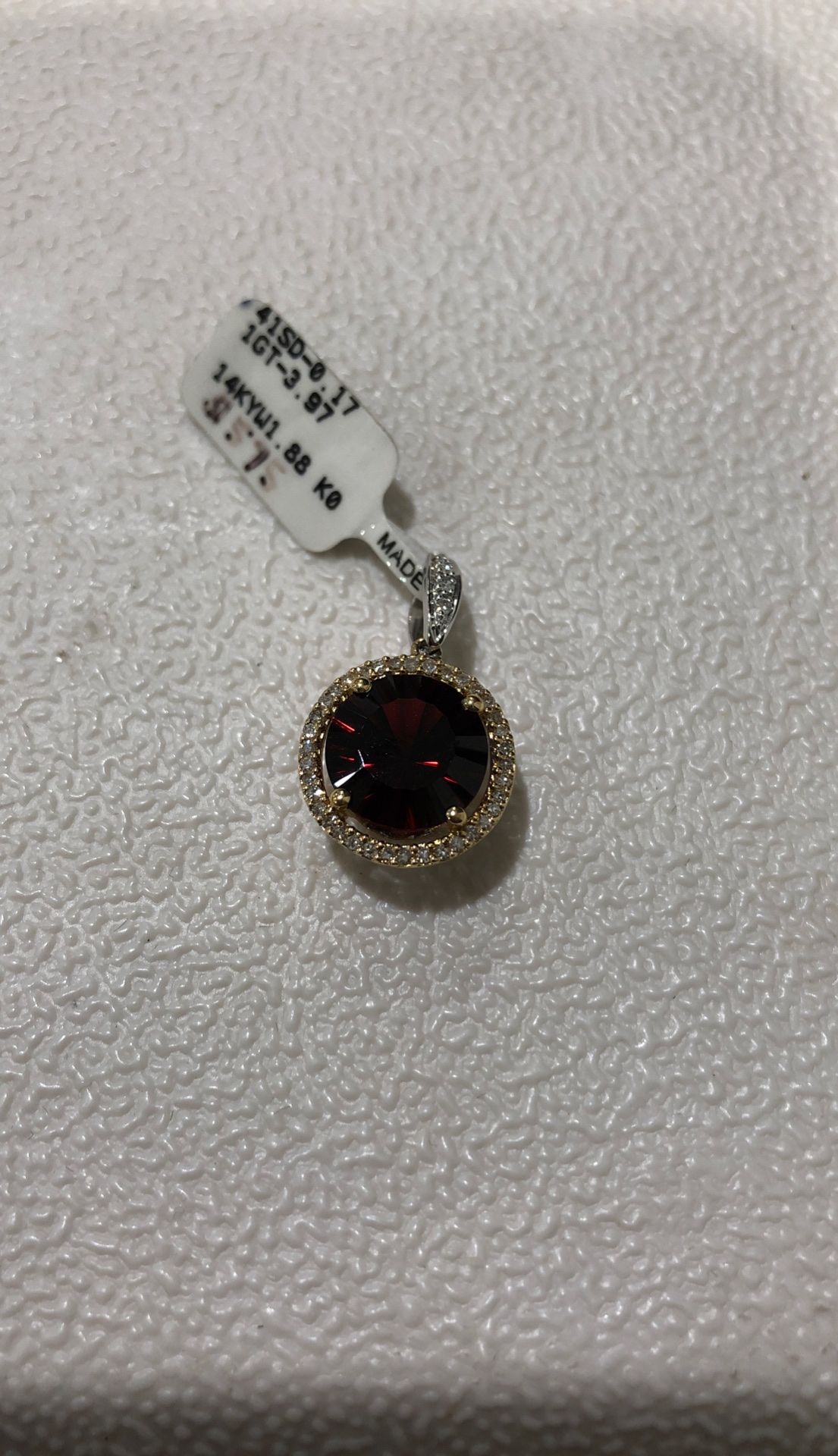 14KT White and yellow gold garnet pendant with diamonds