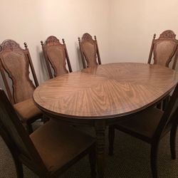 Vintage Dining Table with 6 Cane-Back Chairs – Oval, Seats 6