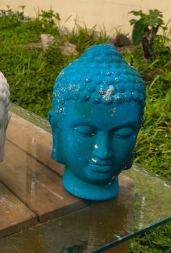 ceramic Buddha head sculpture
