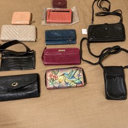 $2-$20- Variety Of Wallets Both New And Eu